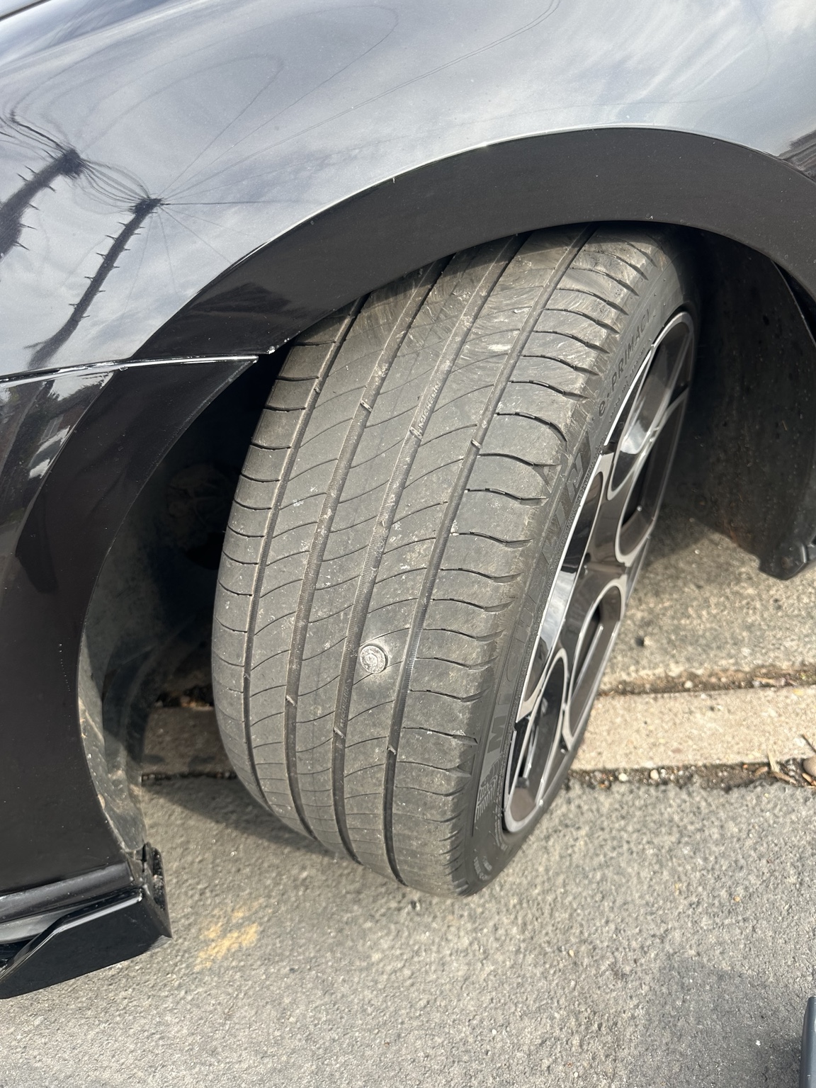 Close-up of a tyre puncture