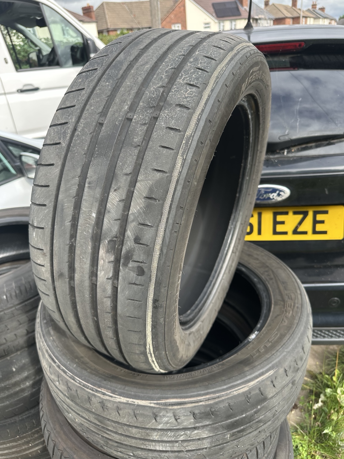 Worn tyres removed during a tyre change